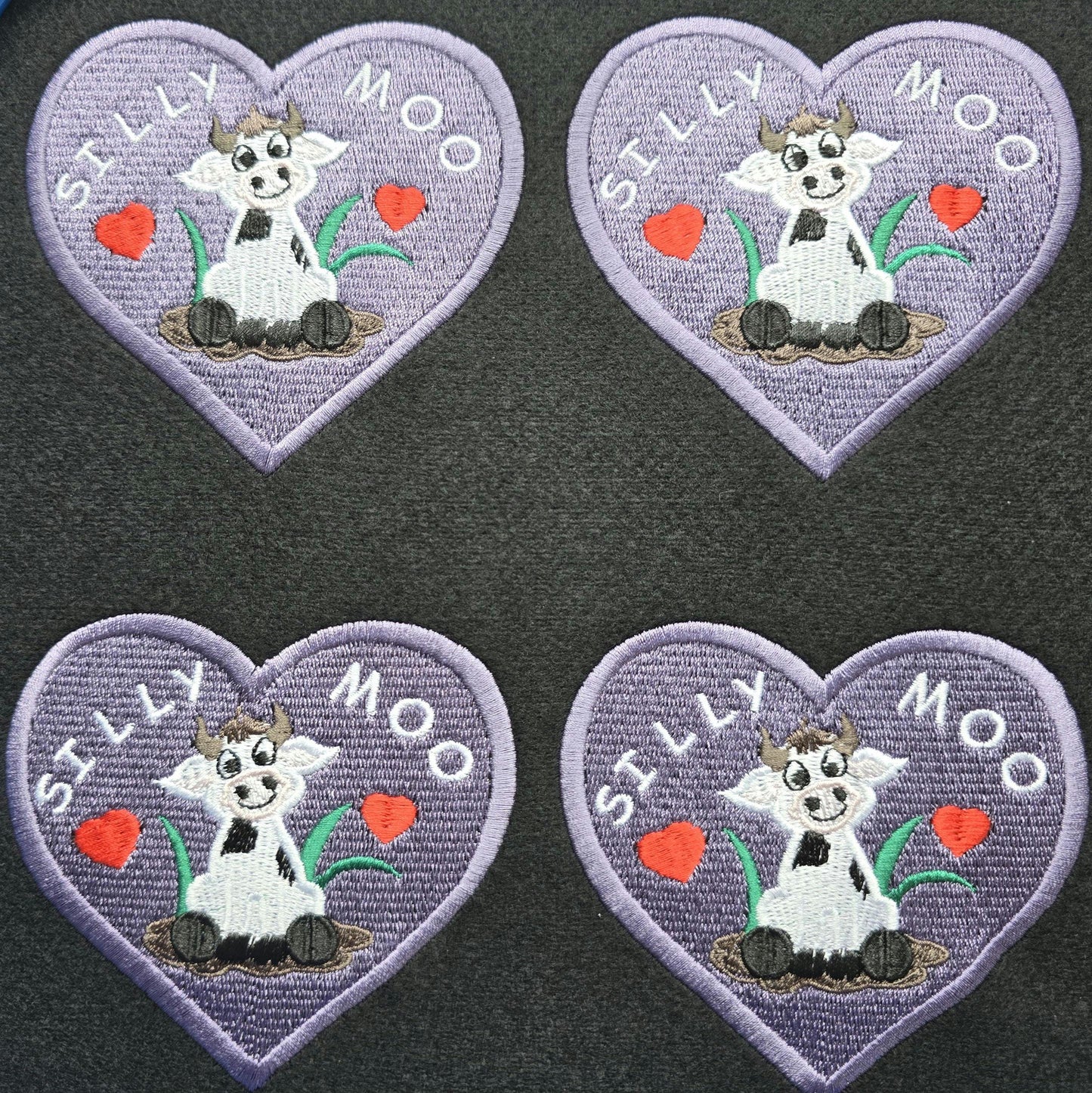 Silly Moo Embroidered Patch – Heart-Shaped Cow in Muddy Puddle