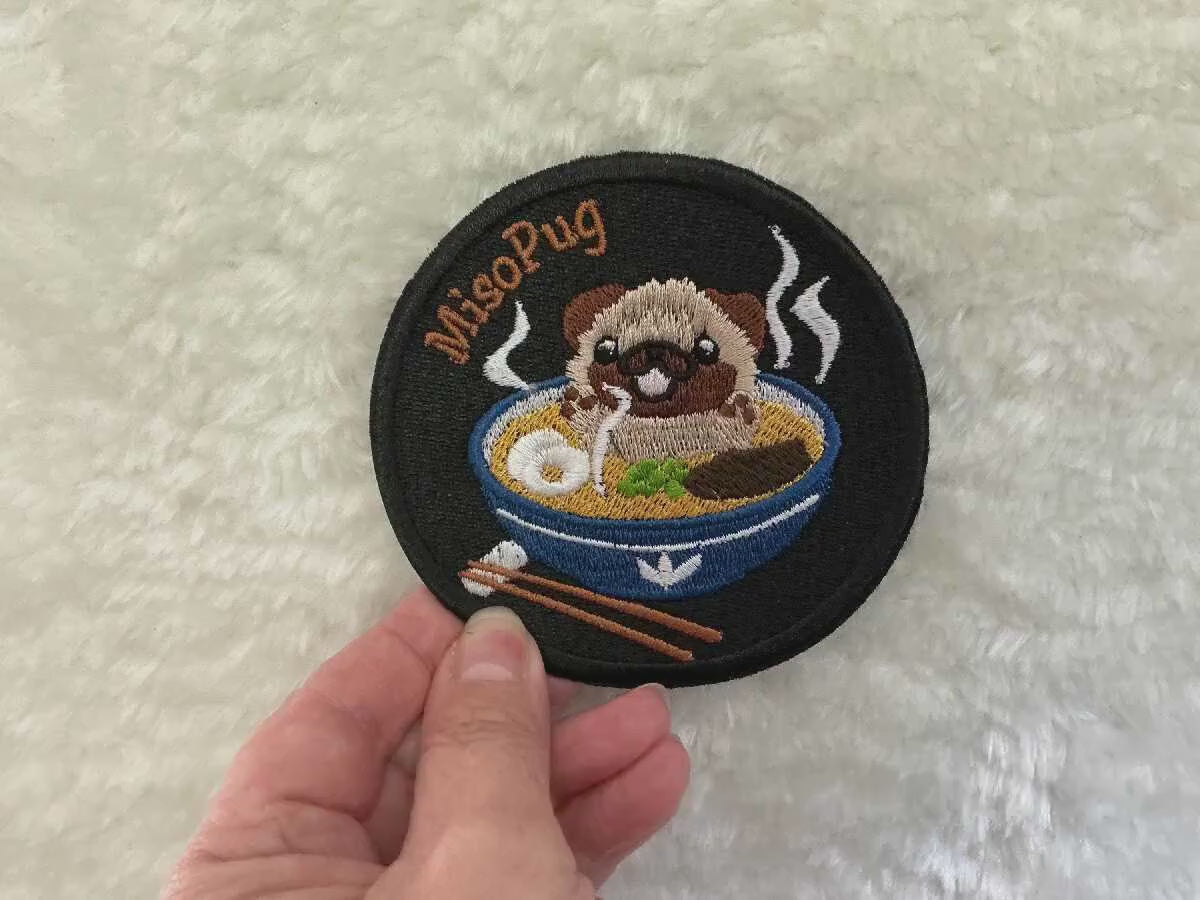 Miso Pug Embroidered Patch – Quirky Iron-On Patch for Dog Lovers & Sushi Fans - 9cm x 9cm - Bags, Jackets, Hats, Repairs to Garments